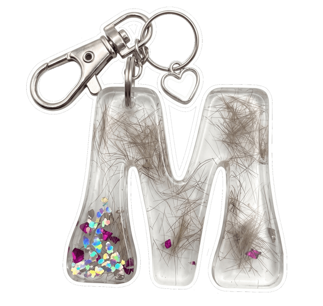 Clear resin letter keychain set with a pet's fur
